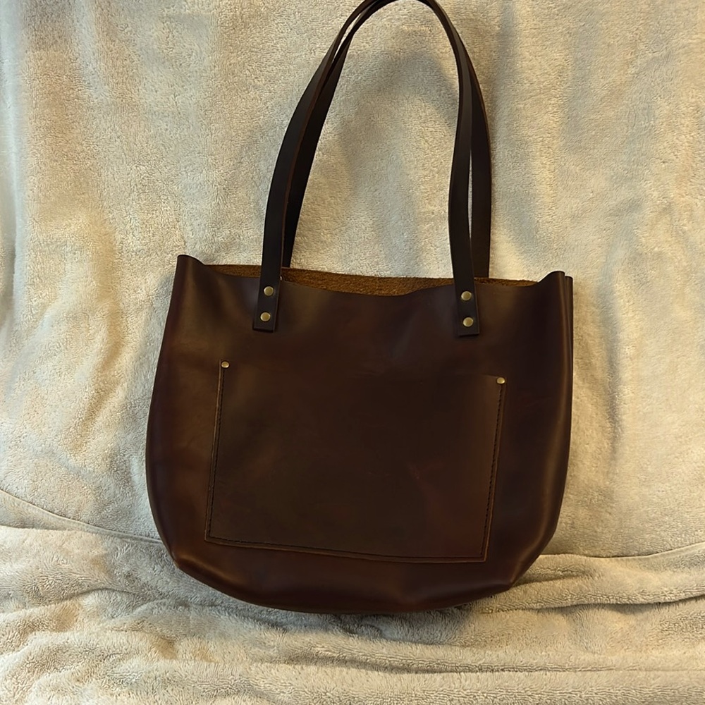 Portland Leather Goods brown bag with leather straps